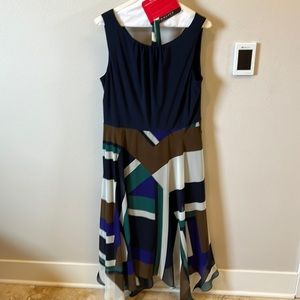 Worn once! Asymmetrical print with asymmetrical skirt. Size 12